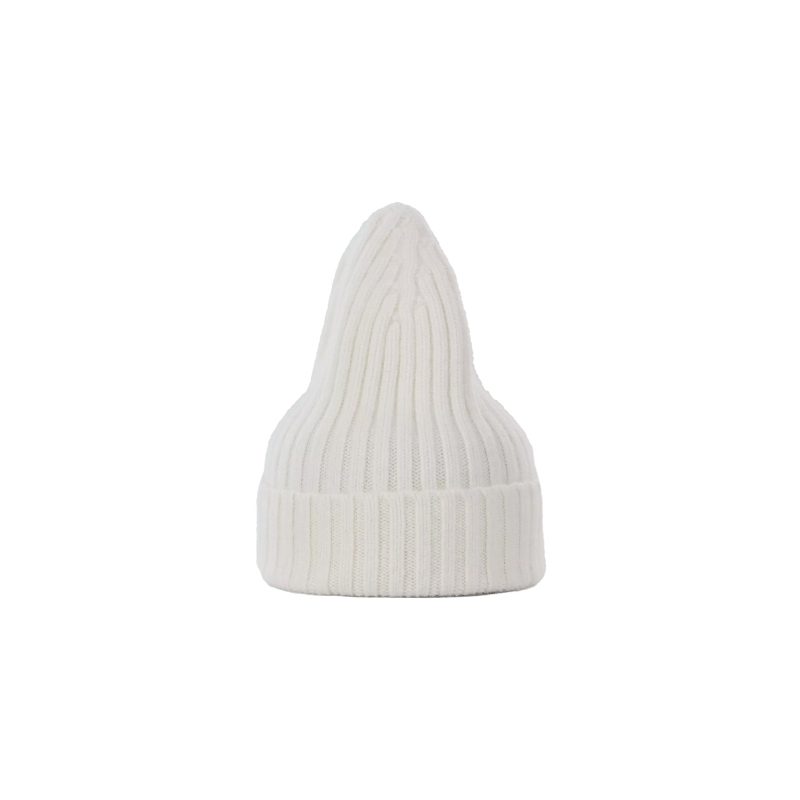 The Le Bonnet Large Beanie, a white ribbed knit hat with a pointed top, offers extreme comfort. Centered on a plain white background, this stylish accessory is ideal for those seeking both warmth and relaxation.