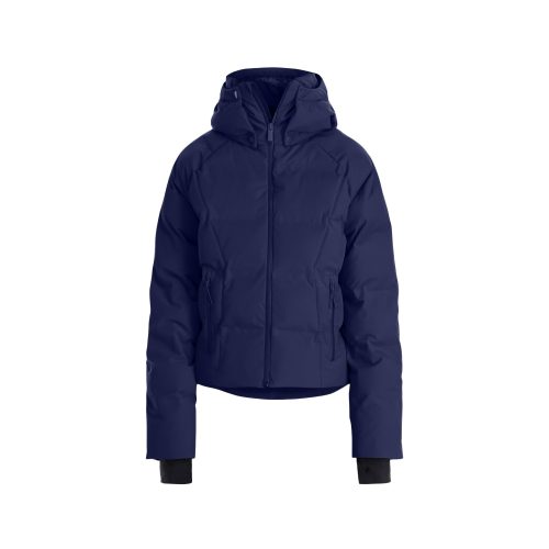 The Georgie Puffer Jacket by Halfdays is a navy blue ski jacket featuring a hood, front zipper, and cuffs, optimized for mountain performance, shown against a white backdrop.