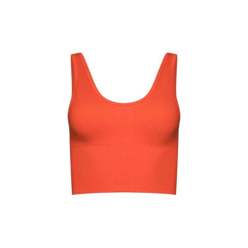 The Marie Top by Halfdays is an orange longline seamless top featuring a scoop neckline and wide shoulder straps, shown on a white background.