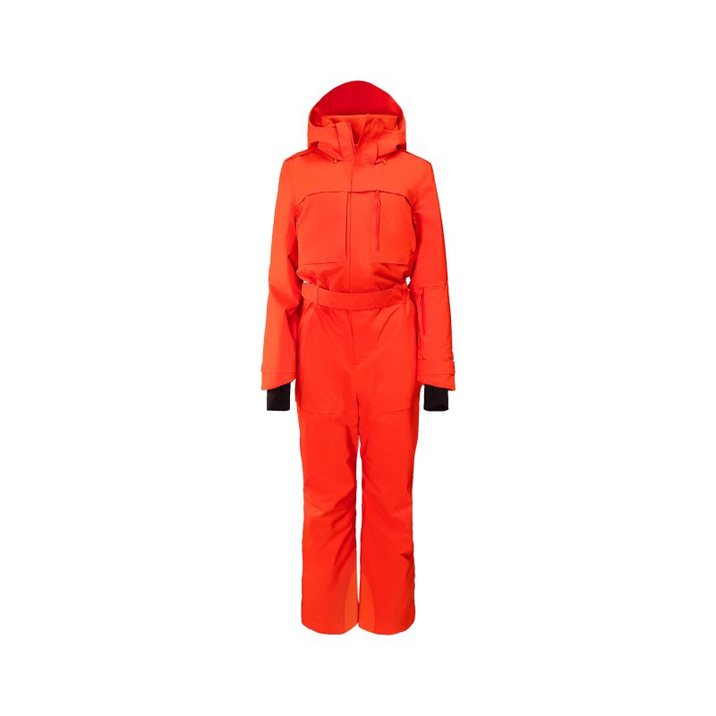 The Murphy Ski Suit by Halfdays features a bright orange design, multiple pockets, and black inner cuffs, showcased against a white background.