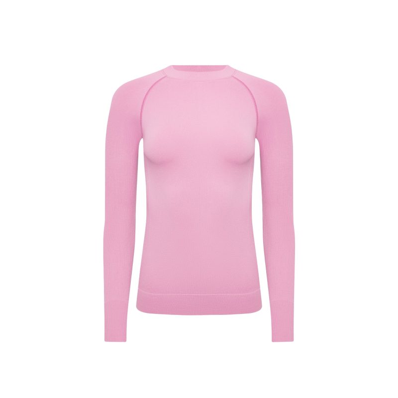 A Johnson top by Halfdays, an ultra-flattering plain pink long-sleeve sweater perfect for an active outdoor fit, showcased on a white background.