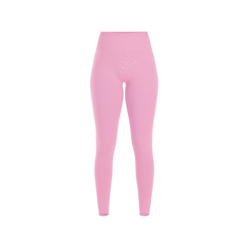 The Halfdays Sophia Legging, featuring a pink high-waisted seamless nylon design, is perfect for outdoor adventures and photographed on a white background.