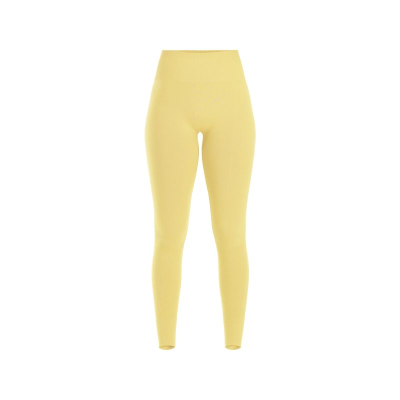 The Sophia Legging by Halfdays adds a burst of sunshine to your outdoor adventure with its high-waisted design. Expertly crafted from seamless nylon, it offers a sleek look and ultimate comfort against a white backdrop.