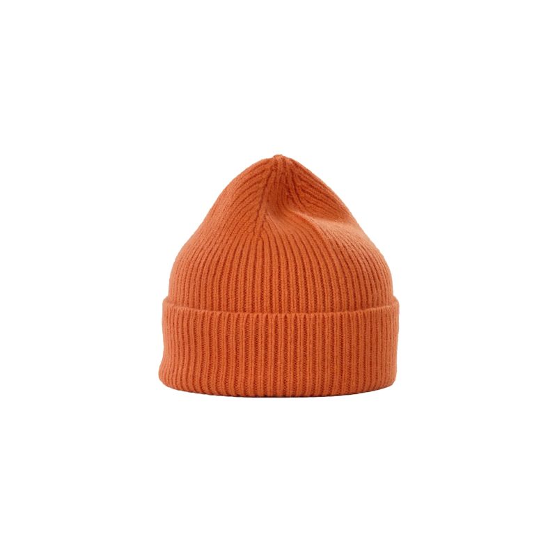 Le Bonnet's lambswool beanie in ribbed orange, featuring a folded brim, is showcased against a plain white background.