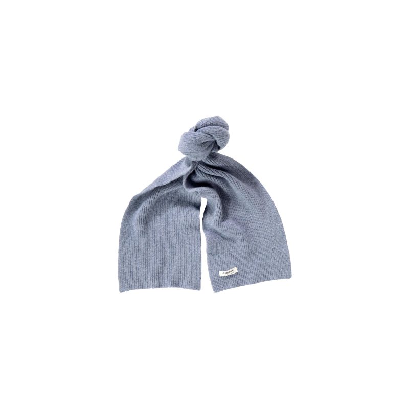 A folded gray knit scarf from Le Bonnet is crafted from soft lambswool, showcasing a knotted design and a small white label.